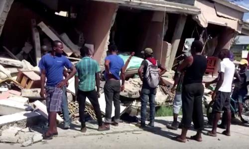 Número de mortos após terremoto no Haiti chega a quase 1.300 Número de mortos após terremoto no Haiti chega a quase 1.300
